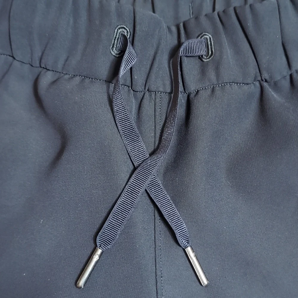 Lululemon On The Fly Pant Woven *Track Stripe Black / Dark Olive | 14 - Picture 7 of 12